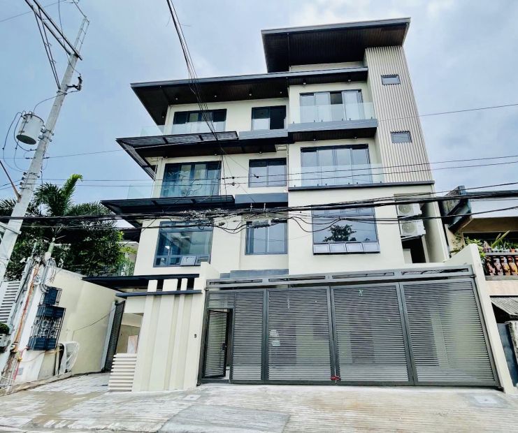 An elegant four storey townhouse for sale in sikap, new zaniga mandaluyong