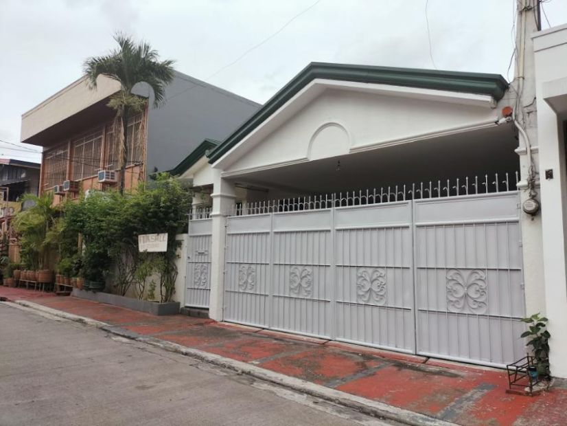 house-and-lot-for-sale-in-kamuning-quezon-city-with-2-car-garage-ph2612