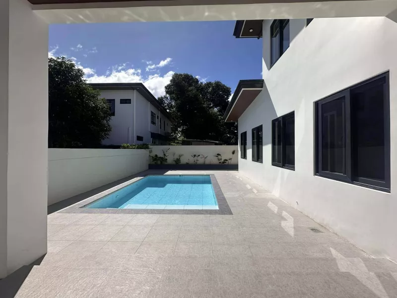Stylish contemporary home available for sale or lease in an upscale neighborhood