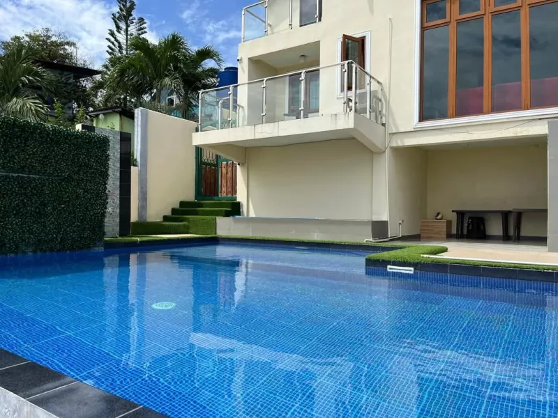 Titled Beach house for sale